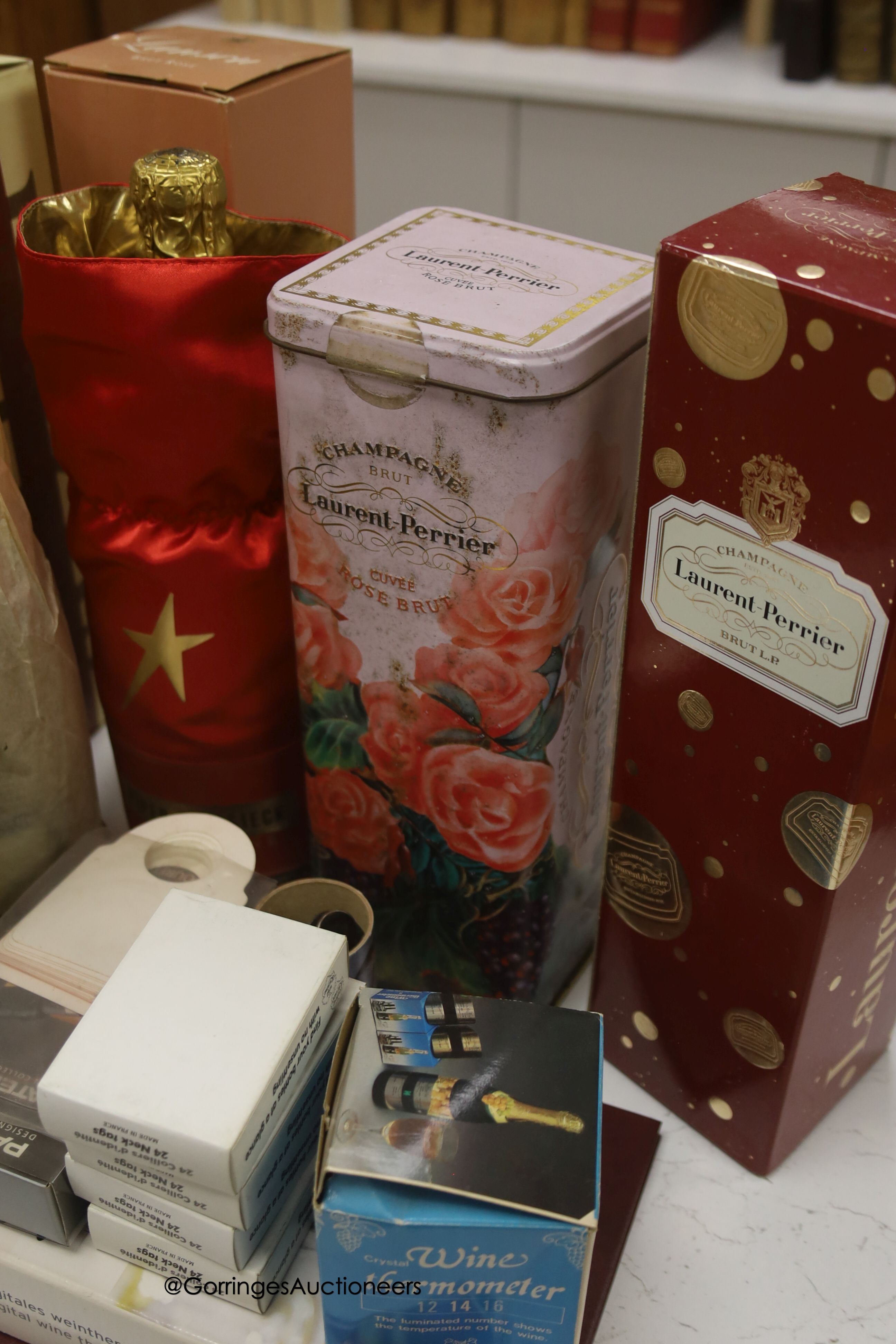 Twelve assorted bottles of champagne including Lanson Pol Roger Jean Rocher and wine related items